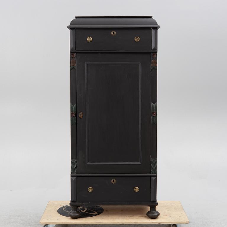 A cabinet, circa 1900.