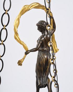 A patinated and ormolu six-light Empire chandelier, Stockholm, first part 19th century.