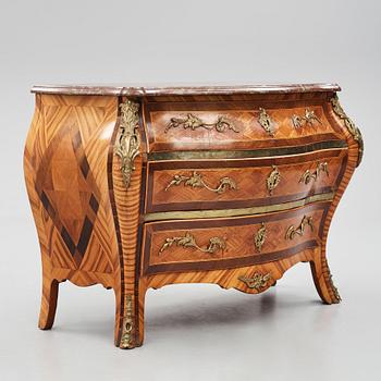 A Swedish Rococo commode, veneered with rosewood and amaranth.