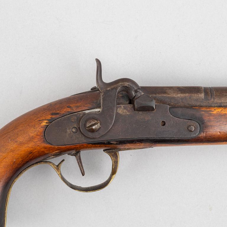 Two 19th century percussion pistols.