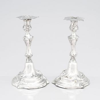 Two Swedish Rococo silver candlesticks, marks of Jakob Lampa, Stockholm 1764 and 1778.