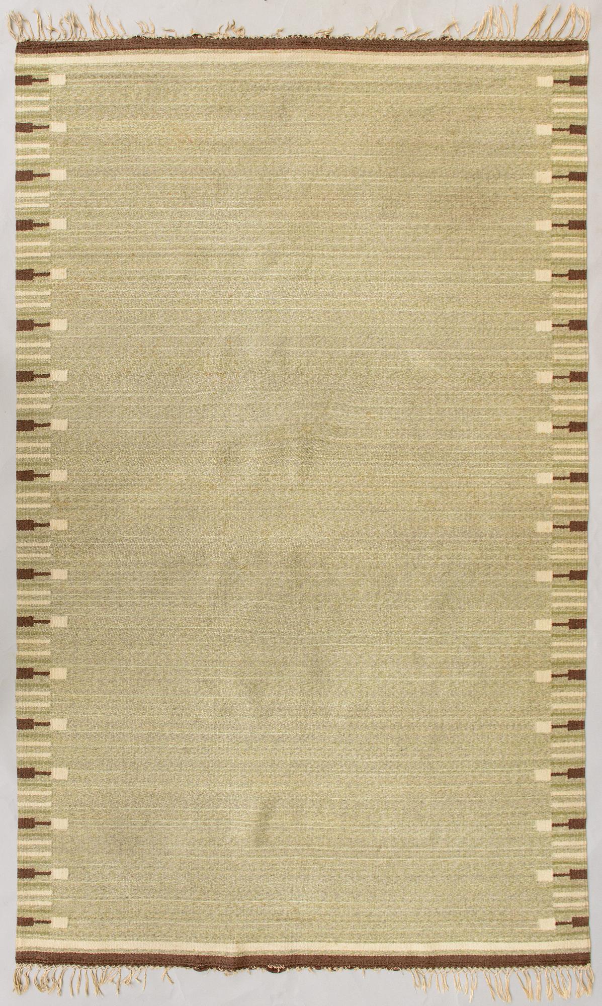 Aappo Härkönen, A 1930s Finnish flat weave carpet. Circa 315x190 cm.