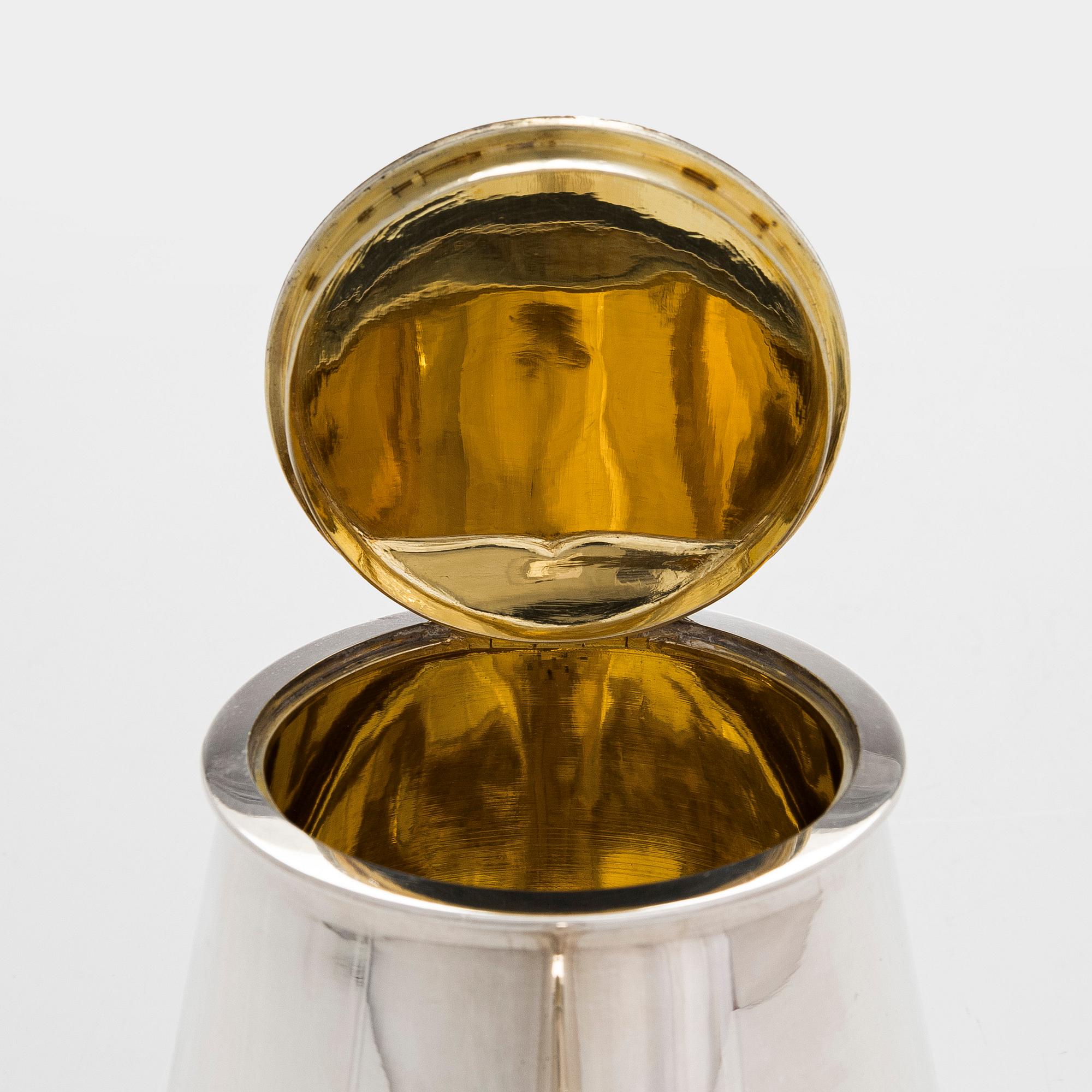 A 19th-century parcel-gilt silver teapot, maker's mark of Johan Heinoin, Saint Petersburg 1878.