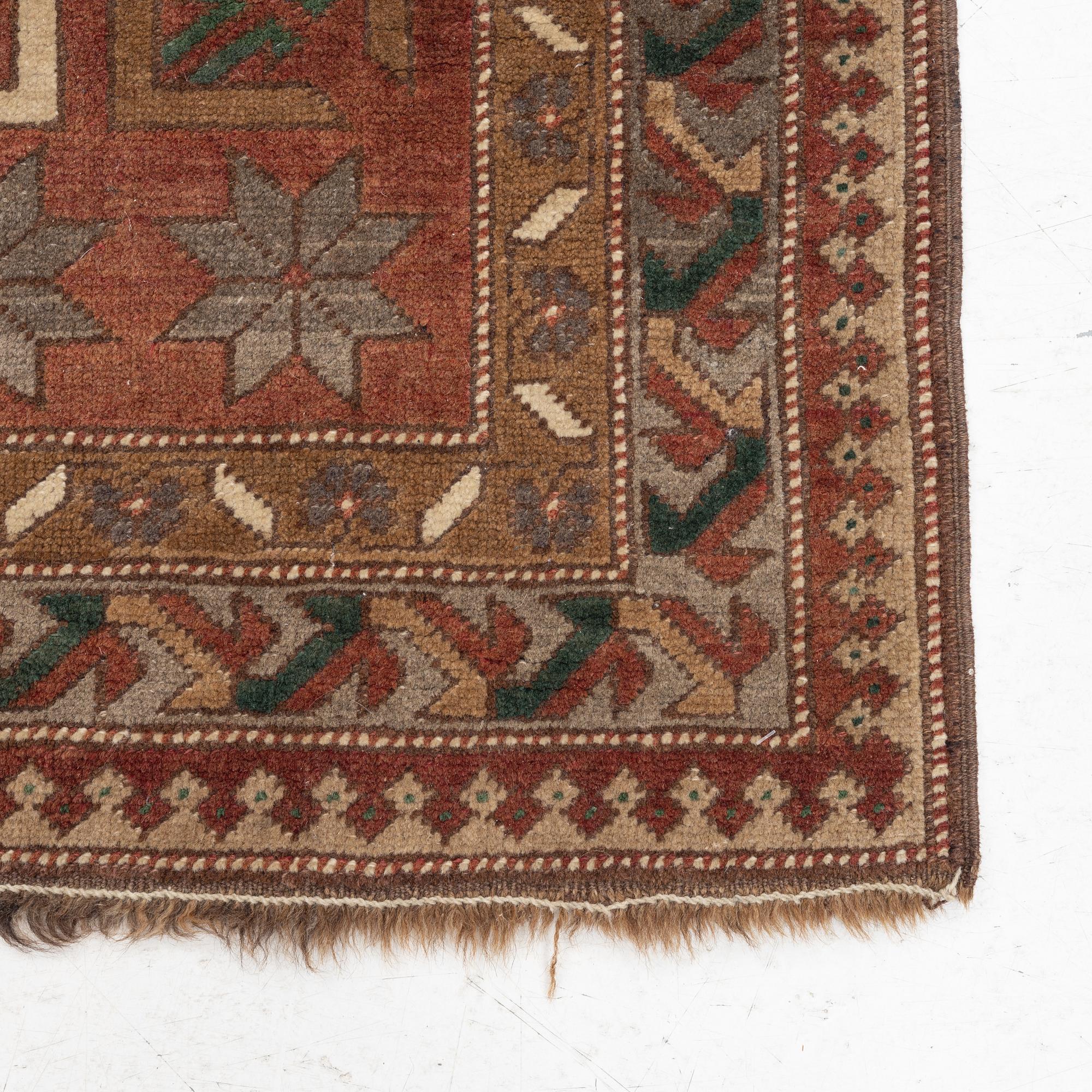 A Kazak rug, semi-antique, c. 137 x 148 cm.