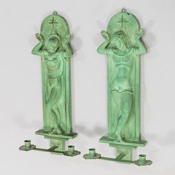 A pair of Art Deco wall sconces, patinated plaster and metal, A. E. Lindskog fecit MCMXXXX.