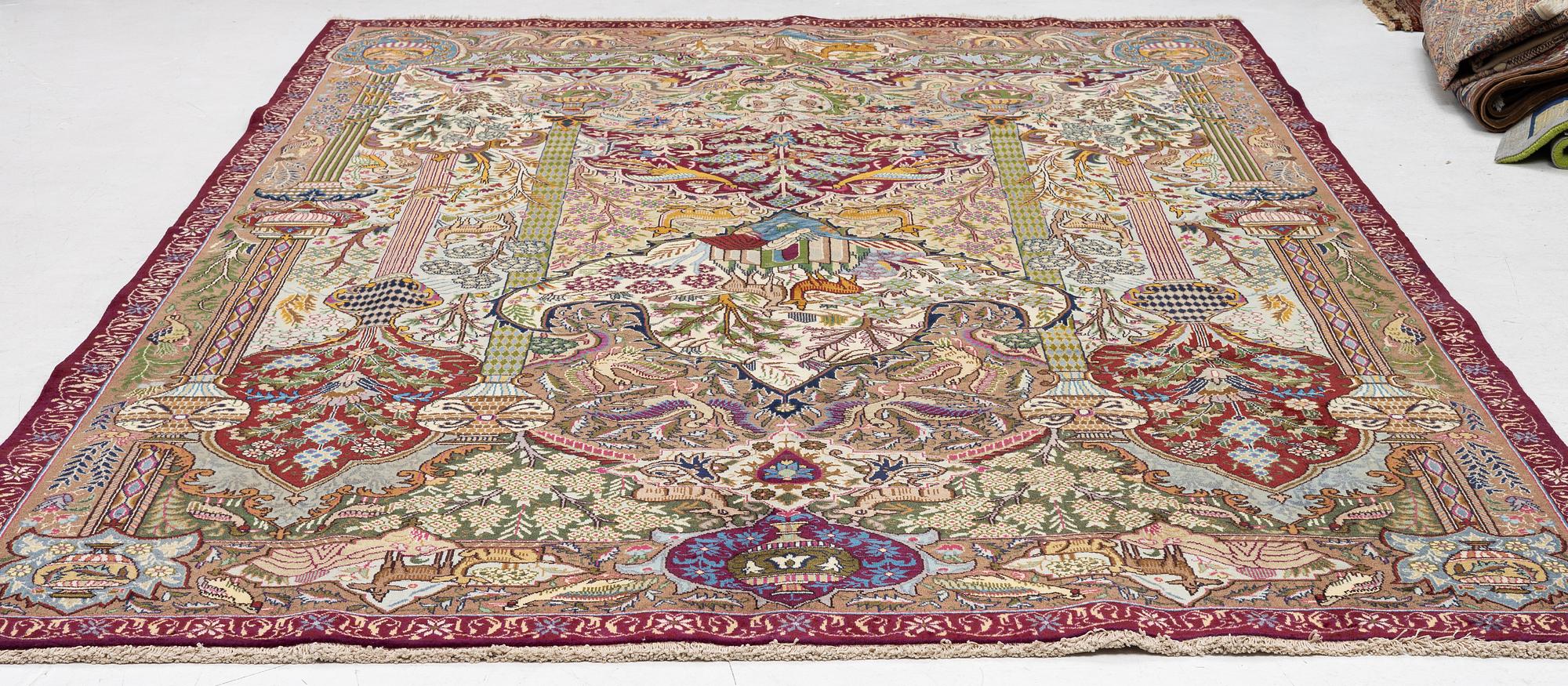 A Kashmar carpet, c. 347 x 242 cm.