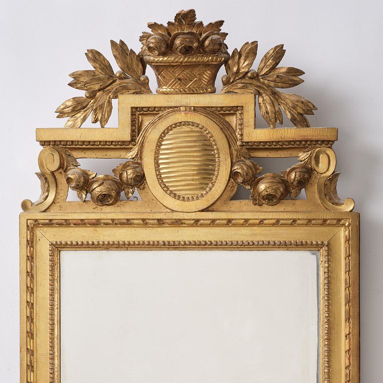 A Gustavian giltwood mirror, Stockholm, late 18th century.