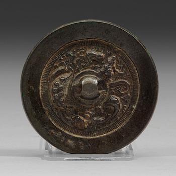 A bronze mirror, Ming dynasty (1368-1644).