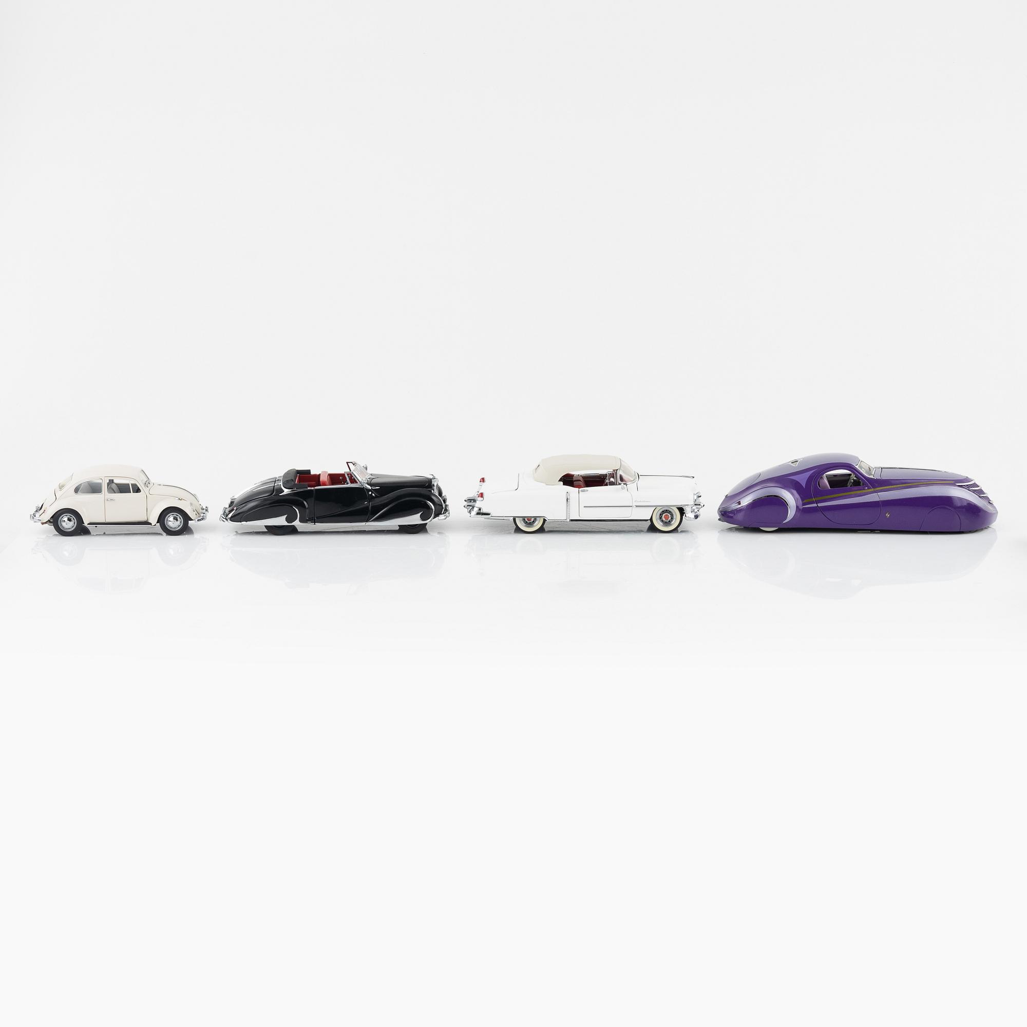 Four die cast model cars and four die cast model motor bikes, Franklin Mint.