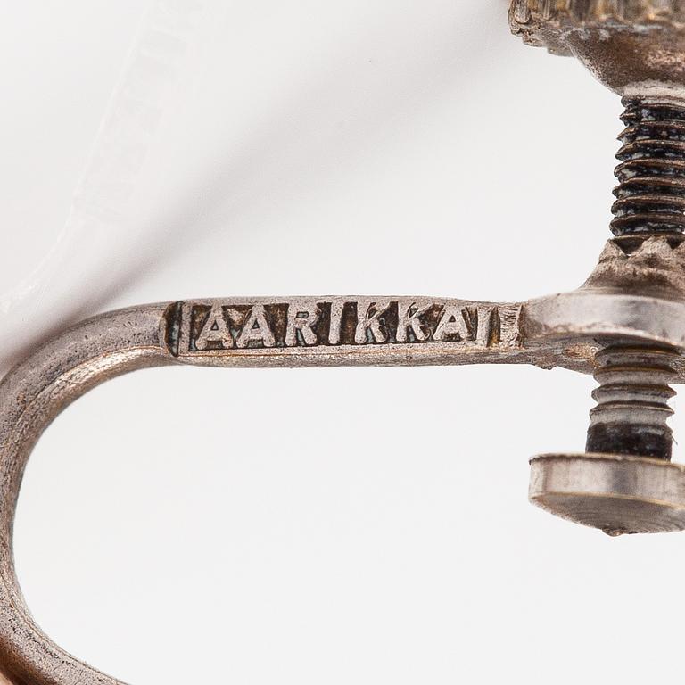 Kaija Aarikka, A necklace, a paid of earrings and a brooch made of silver and wood. Finland.