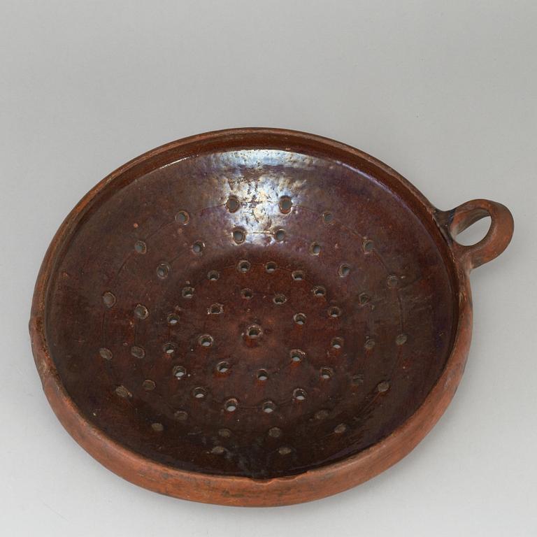 Two pottery strainers, 19th Century, Sweden.
