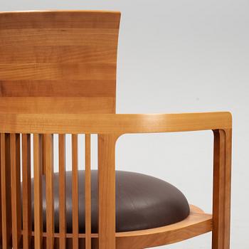 A model 606 'Barrel' chair by Frank Lloyd Wright for Cassina, designed 1937.