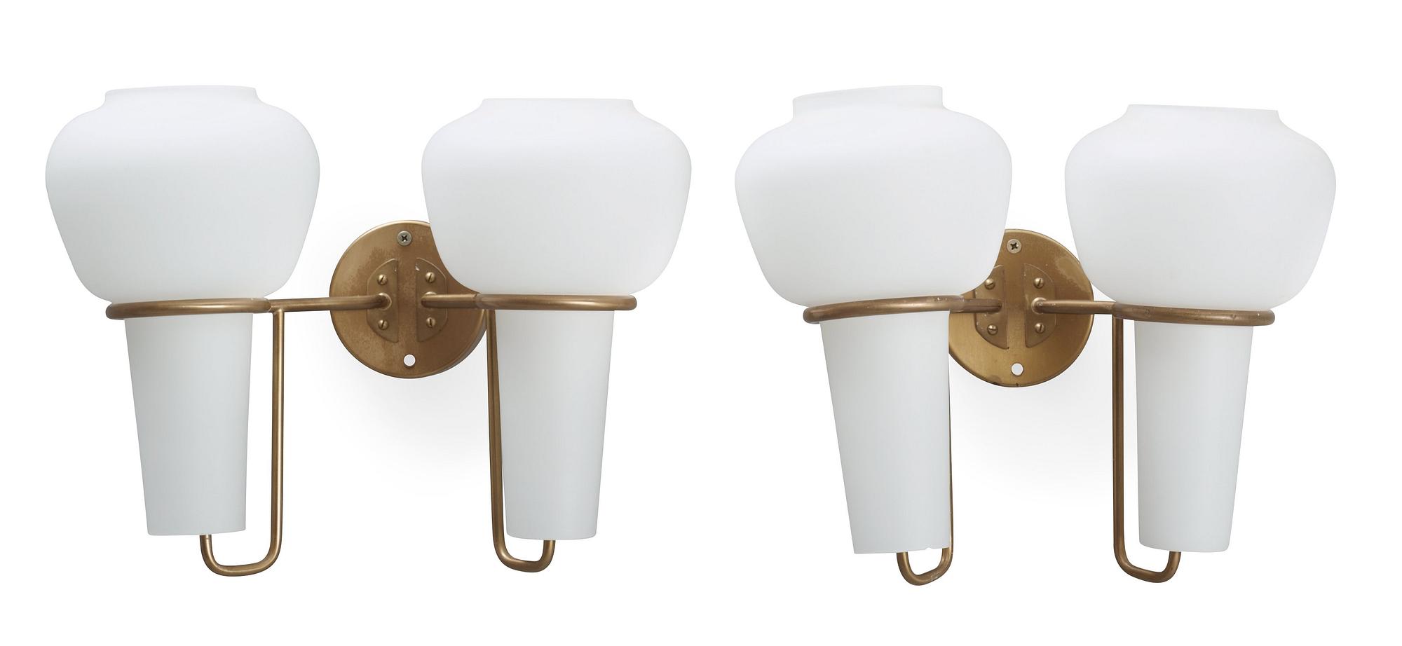 A pair of Hans Agne Jakobsson wall lamps, Markaryd, Sweden 1960's-70's.