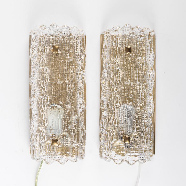 Carl Fagerlund, a pair of glass and brass wall lights, Orrefors, 1960s.