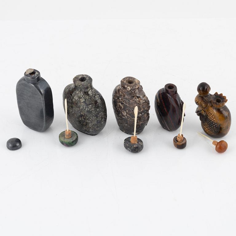 Ten snuff bottles, mottled stone, China, 20th century.