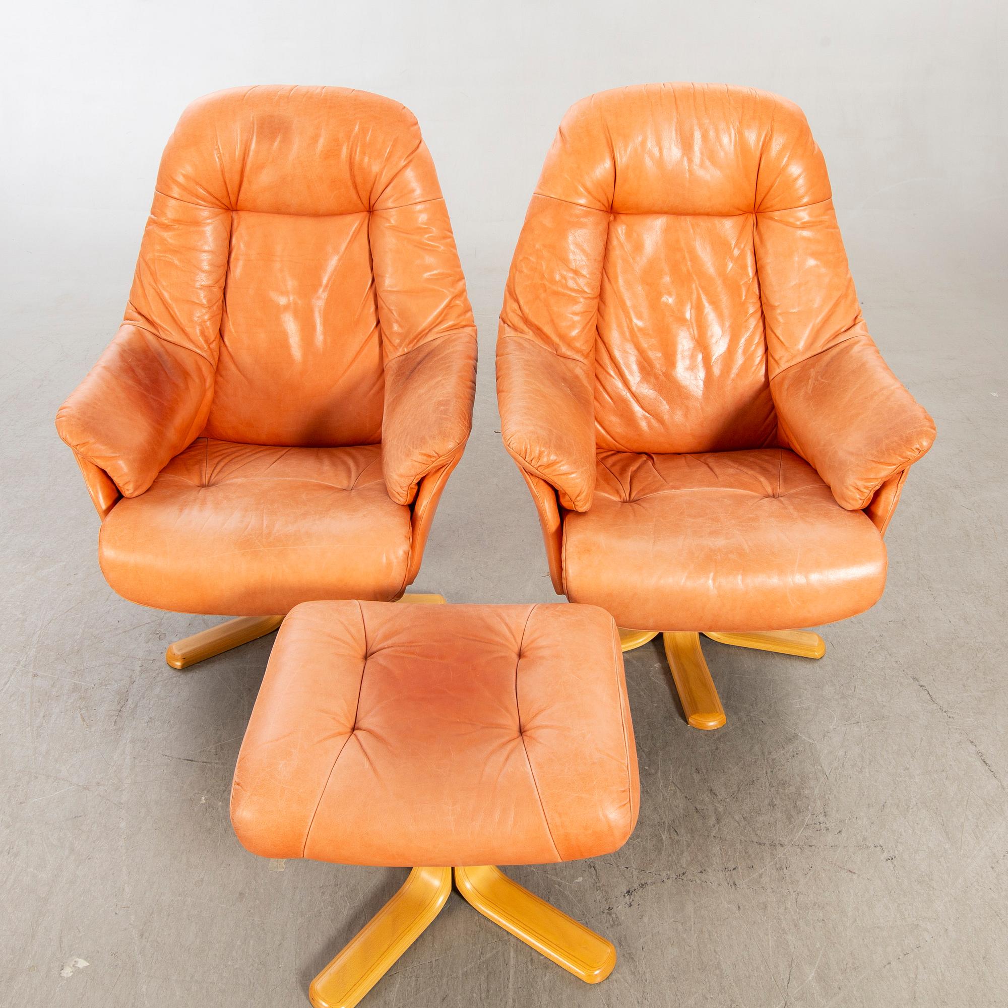 Skalma Denmark, two armchairs with footstool, leather, 20th century later part.