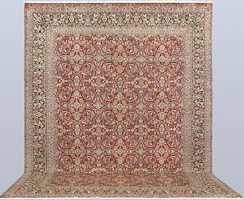 A Kirman Laver carpet, 'Millefleur', approx. 403 x 304 cm.