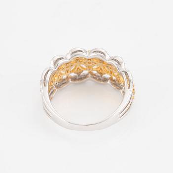 Ring, 18K white gold with yellow marquise-cut and white brilliant-cut diamonds.