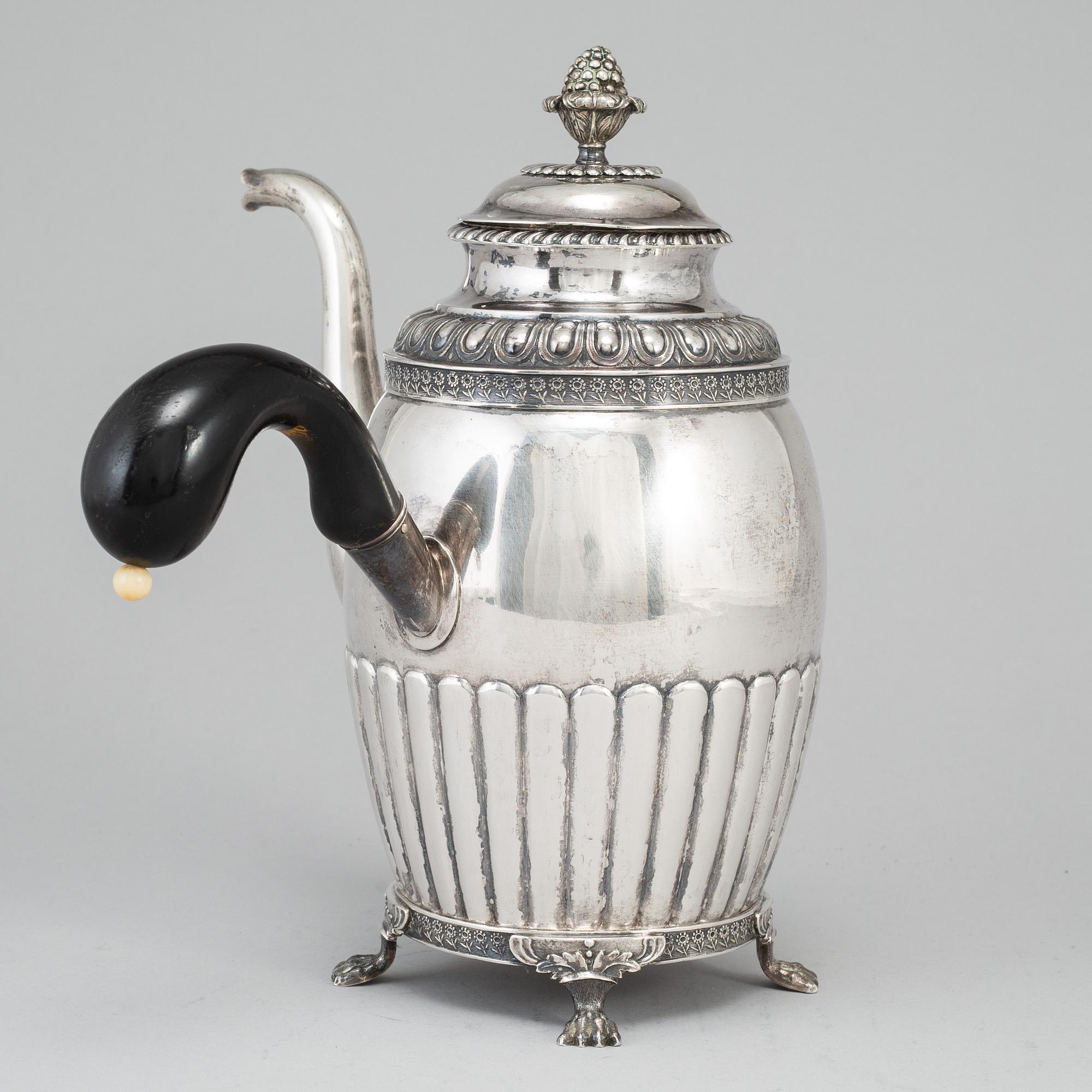 A silver coffee pot by Gustaf Folcker, Stockholm 1831.