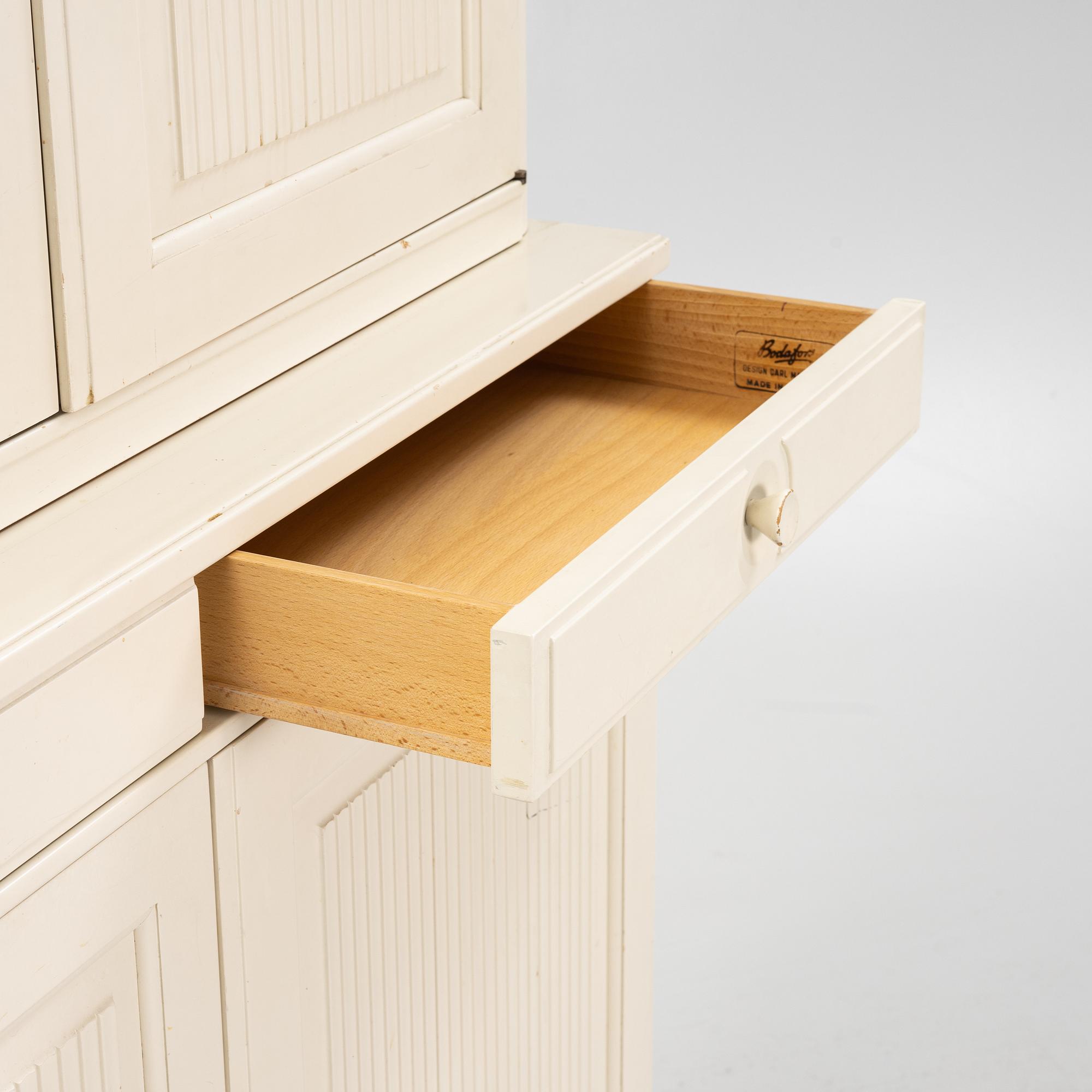 Carl Malmsten, two-part cabinet, "Herrgården", Bodafors, second half of the 20th century.