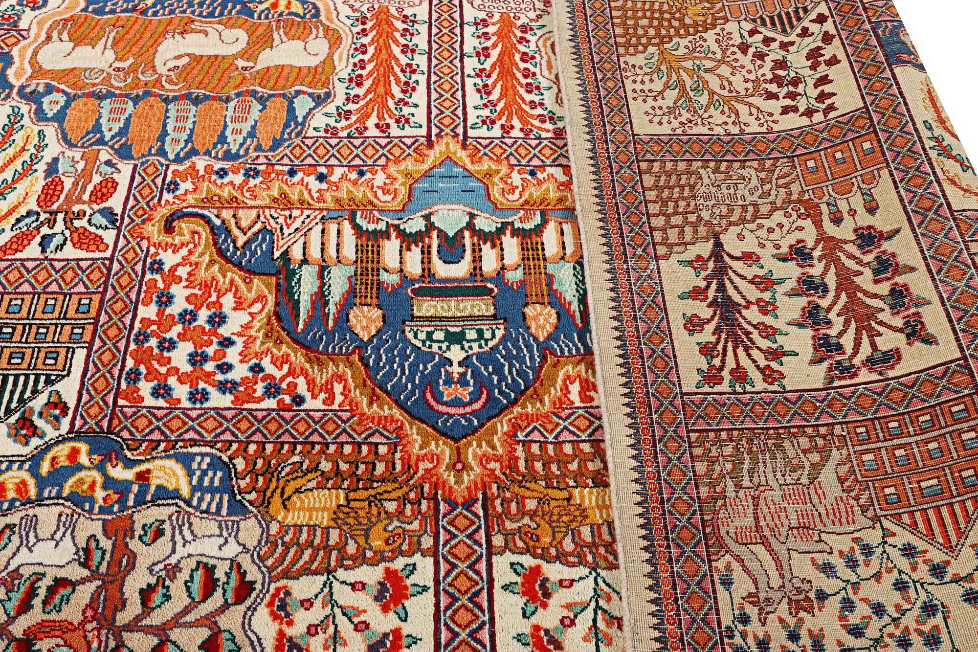 A Kashmar carpet, c. 391 x 291 cm.