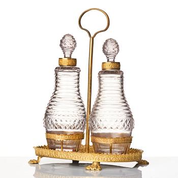 A Empire gilded brass and glass, cruet-set.