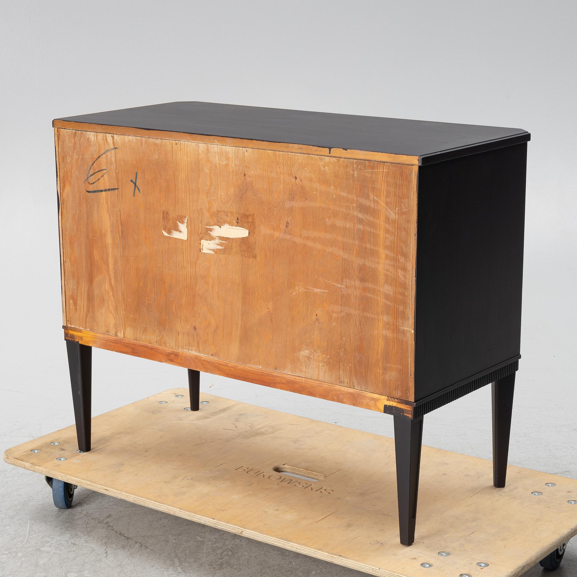 A chest of drawers, mid-20th century.