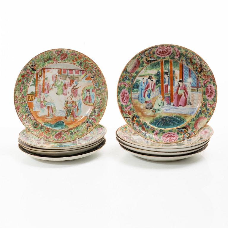 A matched set of 14 famille rose 'Canton' dinner plates, Qing dynasty, 19th century.