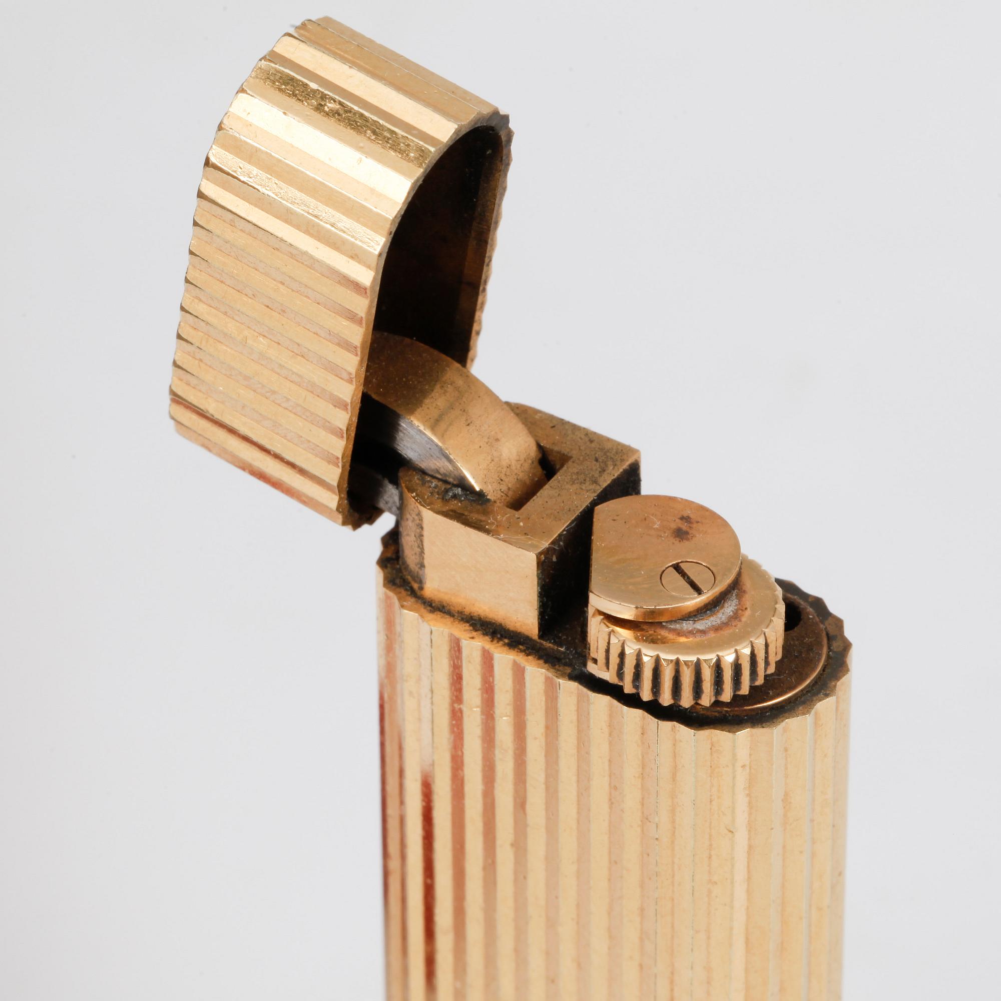 TÄNDARE, gulddoublé, Cartier, Paris.