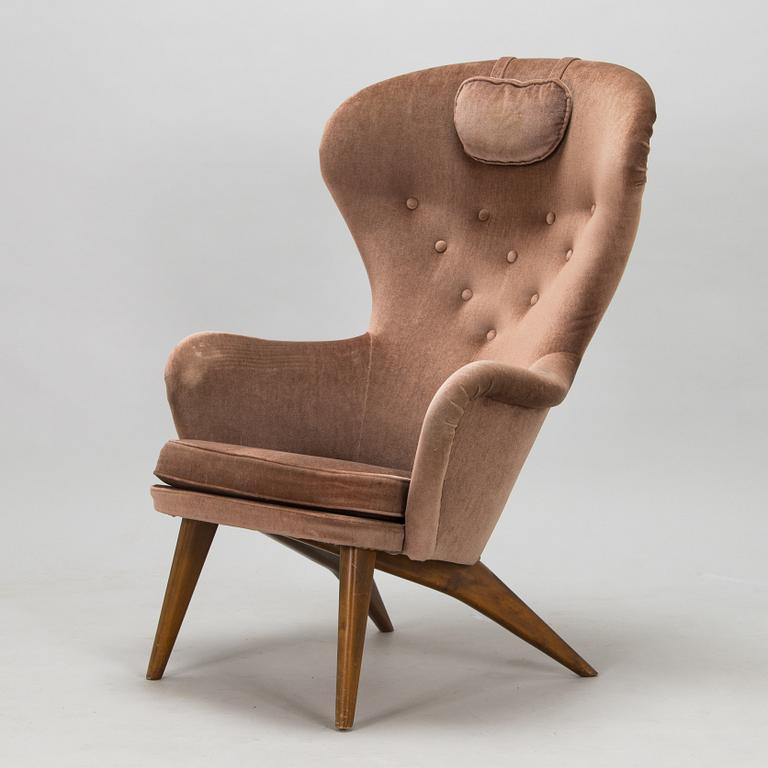 Carl Gustaf Hiort af Ornäs, a 'Siesta' armchair,  Puunveisto Oy - Träsnideri Ab, Finland 1940s-50s.