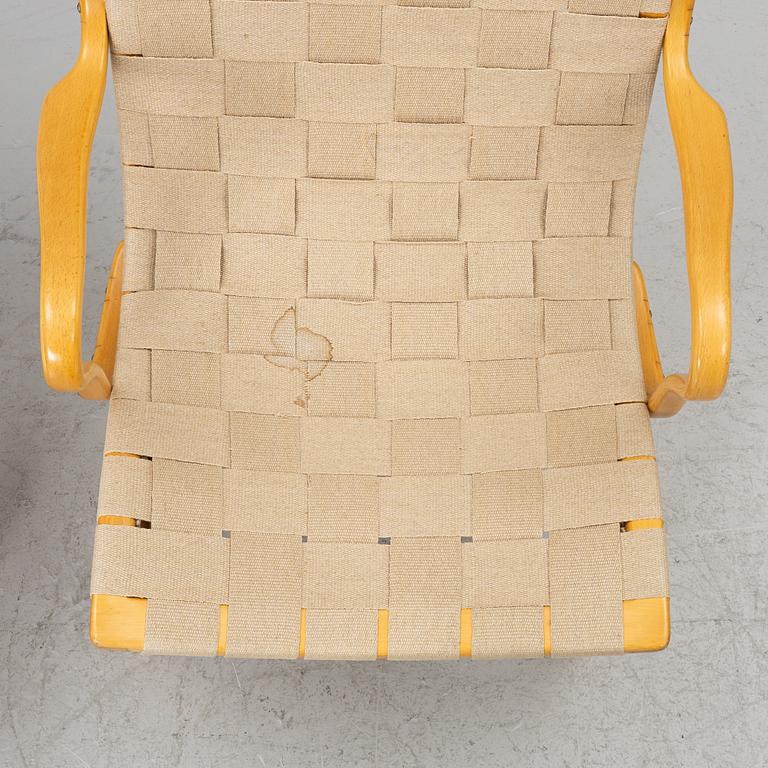 Bruno Mathsson, Armchairs, a pair, “Eva”, Firma Karl Mathsson, Värnamo, 1963 and 1964.