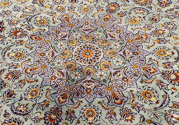A Kashan carpet, 410 x 300 cm.