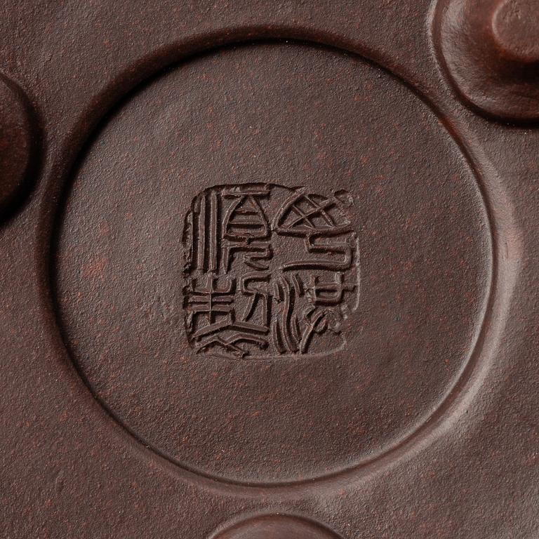 Two Chinese yixing teapots, early 1900s and 1980s.