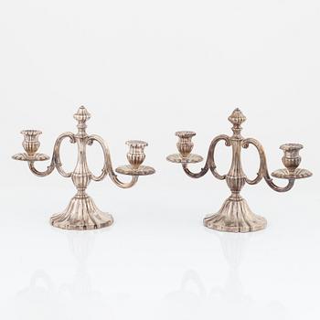 A pair of silver candelabras, swedish import mark.