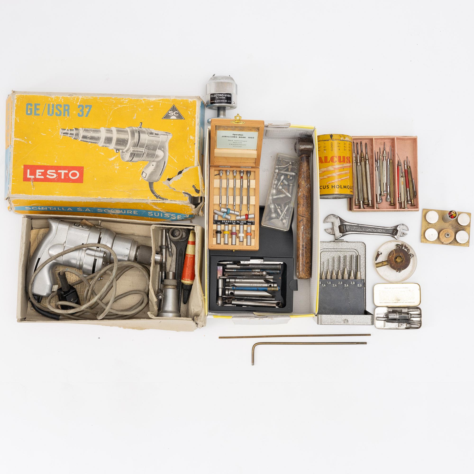 Watchmaking tools and spare parts, including a lathe by Lorch.