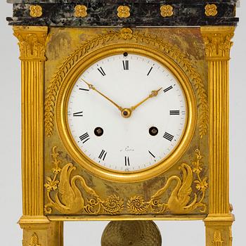 A French mantel clock, first half of the 19th century.