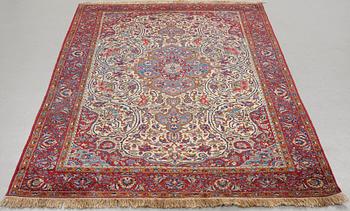 Matto, a semi-antique silk Kashan, ca 212,5-214,5 x 134,5-135,5 cm.