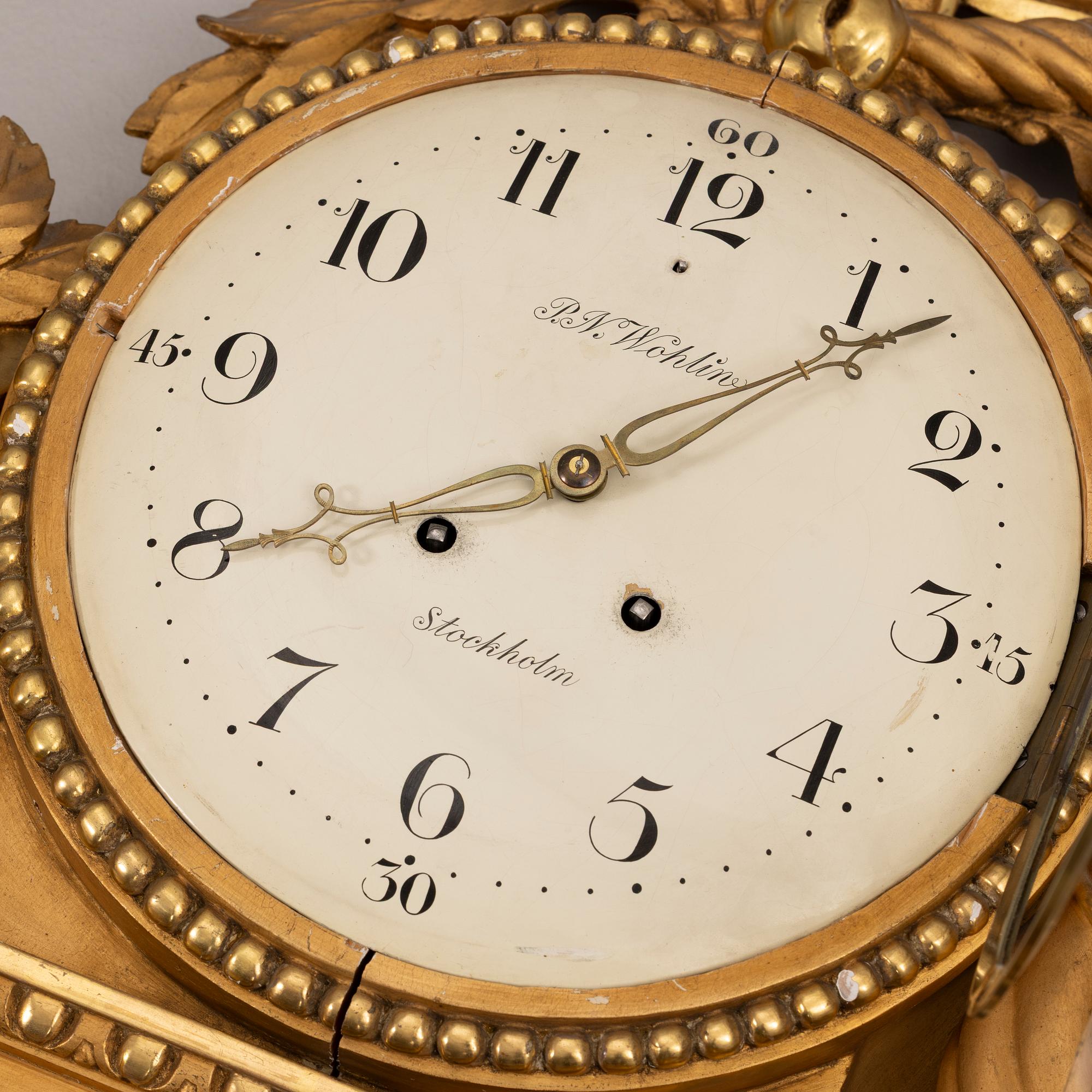 Wall clock, Gustavian style, P.N. Wohlin, Stockholm, 20th century.