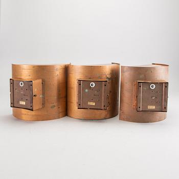 A set of three copper wall lamps from Falkenbergs belysning 1960/70s.