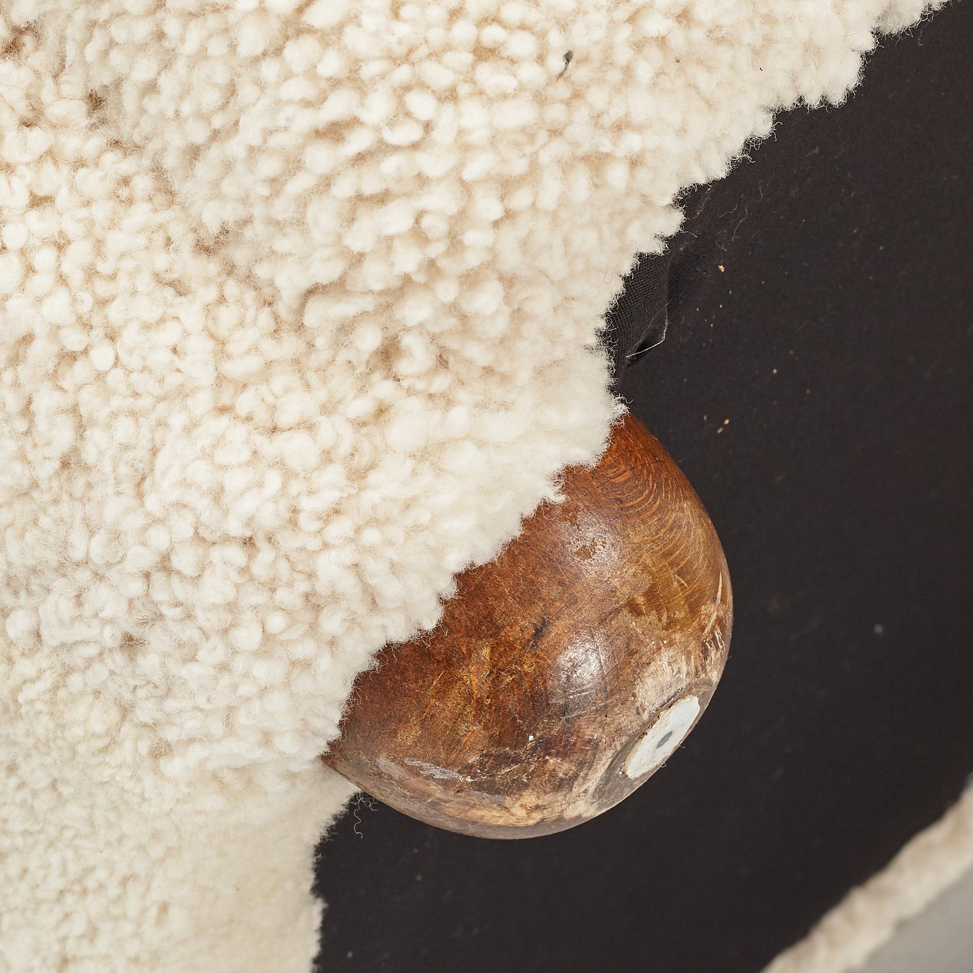 A pair of Danish Modern sheepskin armchairs, 1930's/40's.