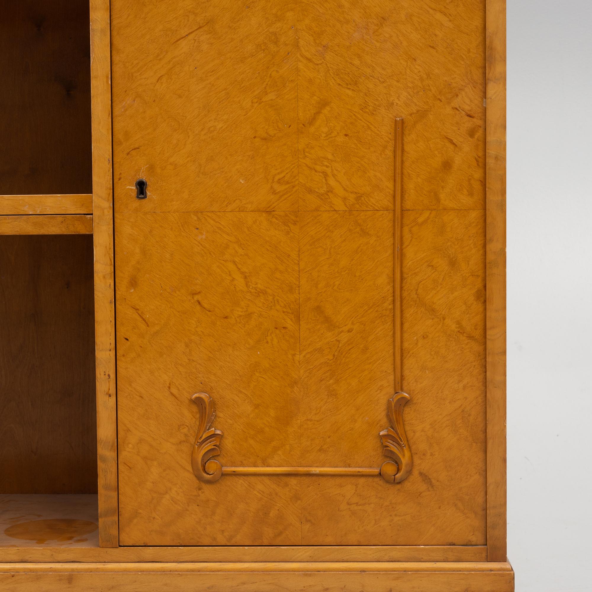 A bookcase with cabinet, 1940's.