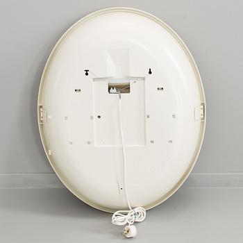 A "SPACE AGE" WALL MIRROR WITH LIGHT BY ALLIBERT, 1970´s.