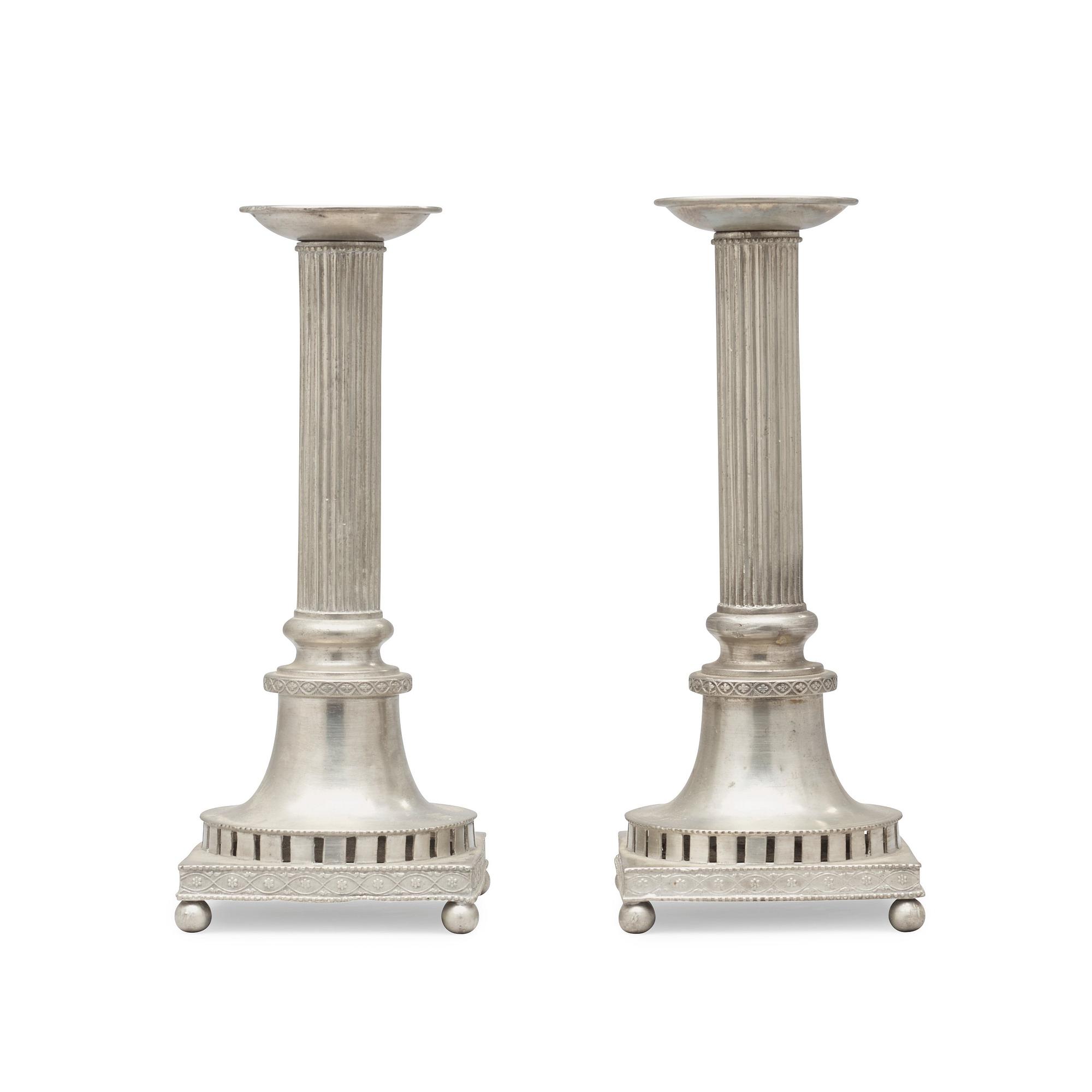 A pair of late Gustavian pewter candlesticks by H Wicksten, master 1782.