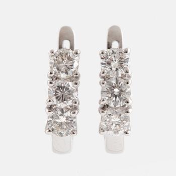 Brilliant-cut diamond earrings.