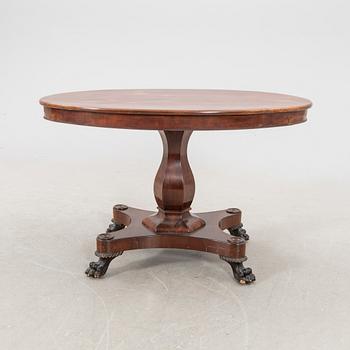 A mid 1800s late Empire mahogany table.