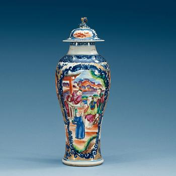 1706. A blue and white and famille rose vase with cover, Qing dynasty, Qianlong (1736-95).