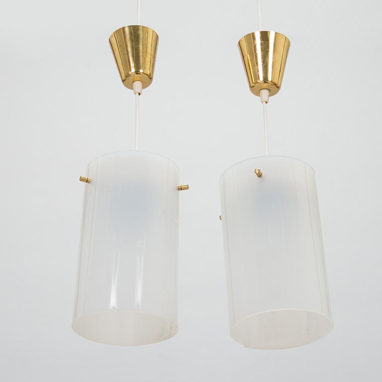 A pair of mid-20th century pendant lights for SO, Pohjoismainen Sähkö Oy, Finland.