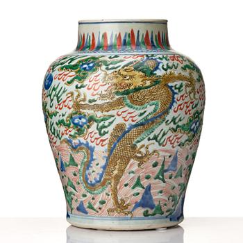 A matched pair of Transitional Wucai jars, 17th Century.