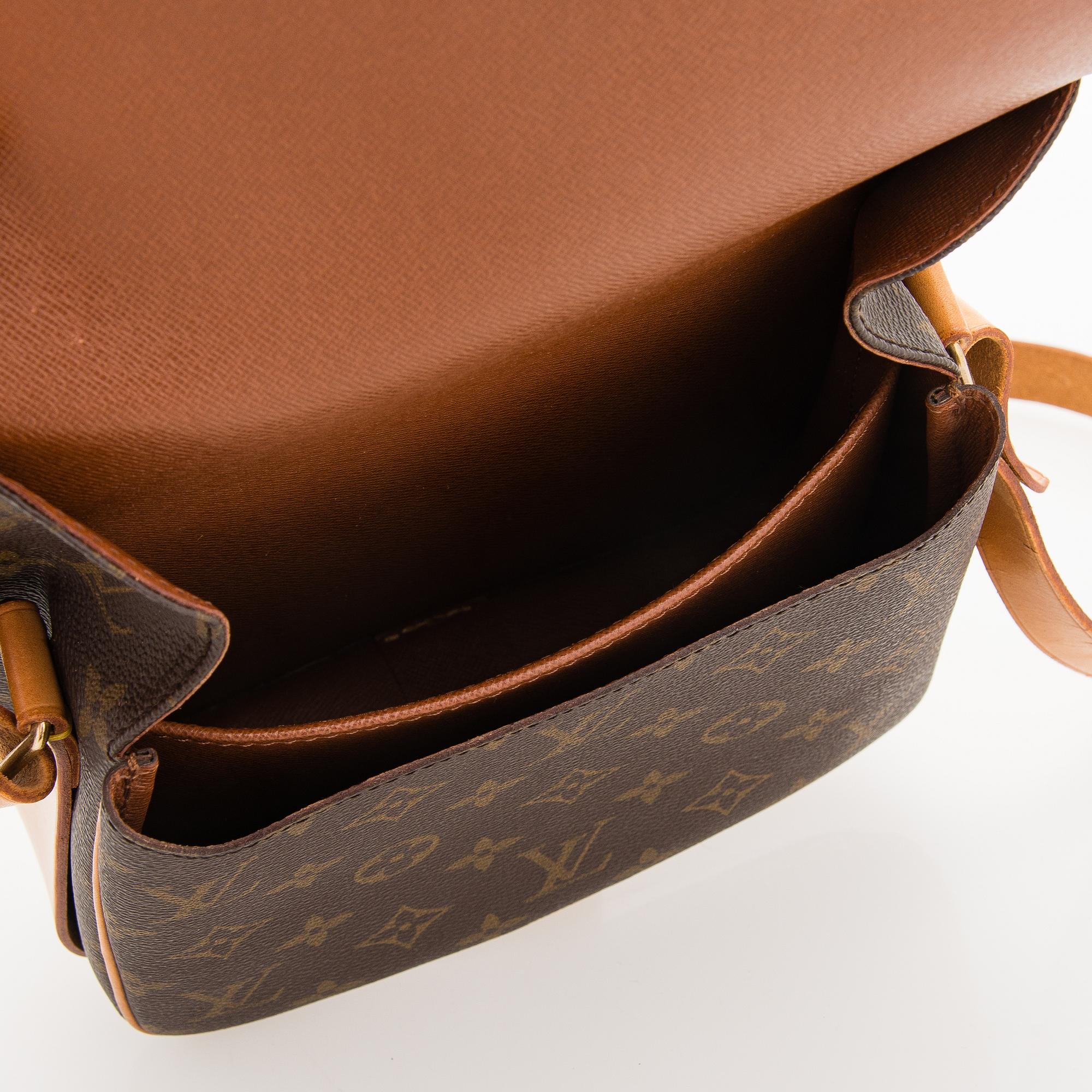 Louis Vuitton, A Monogram 'Cartouchiere' Bag.