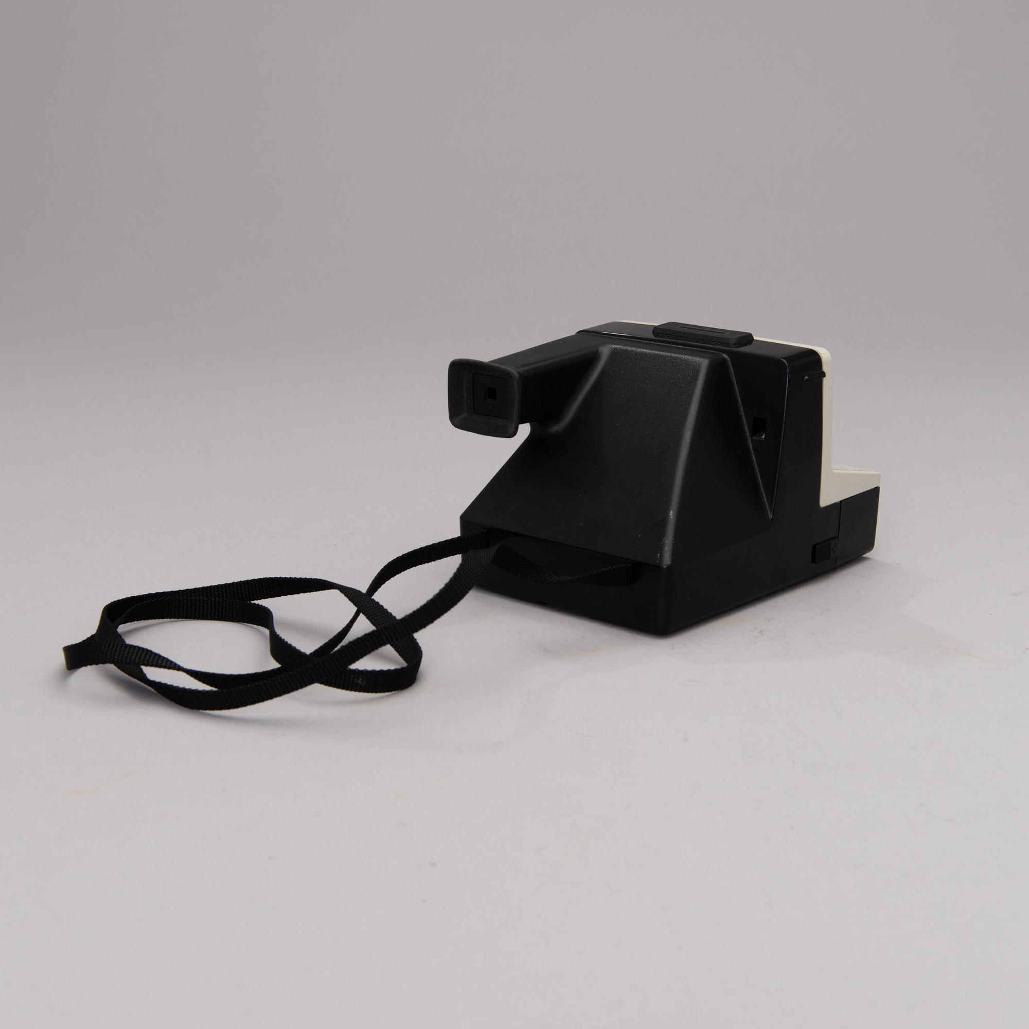 A Polaroid Land OneStep camera from the 1970s.